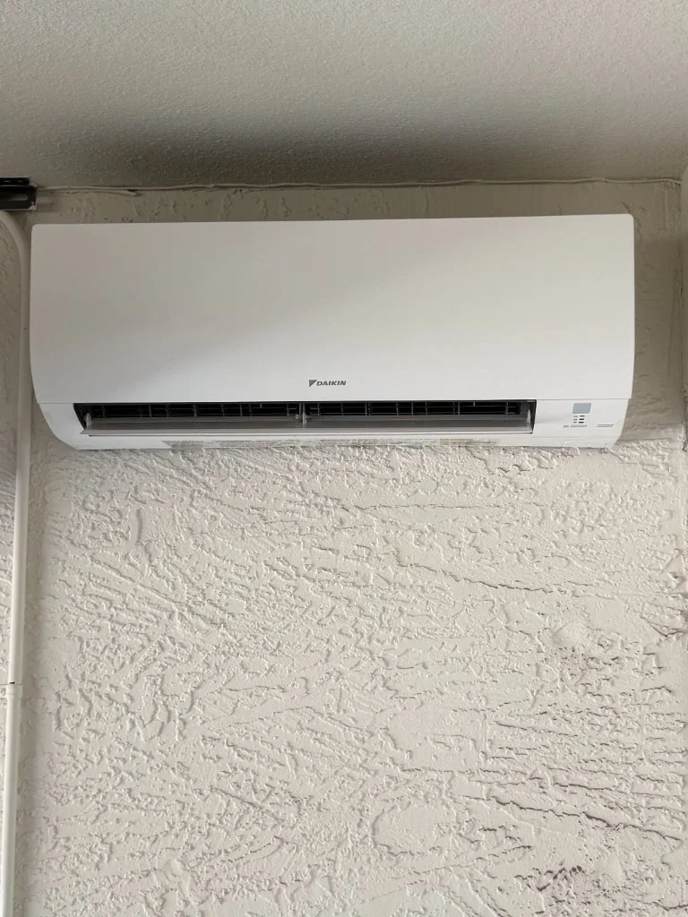 Wall-mounted mini-split in a finished room
