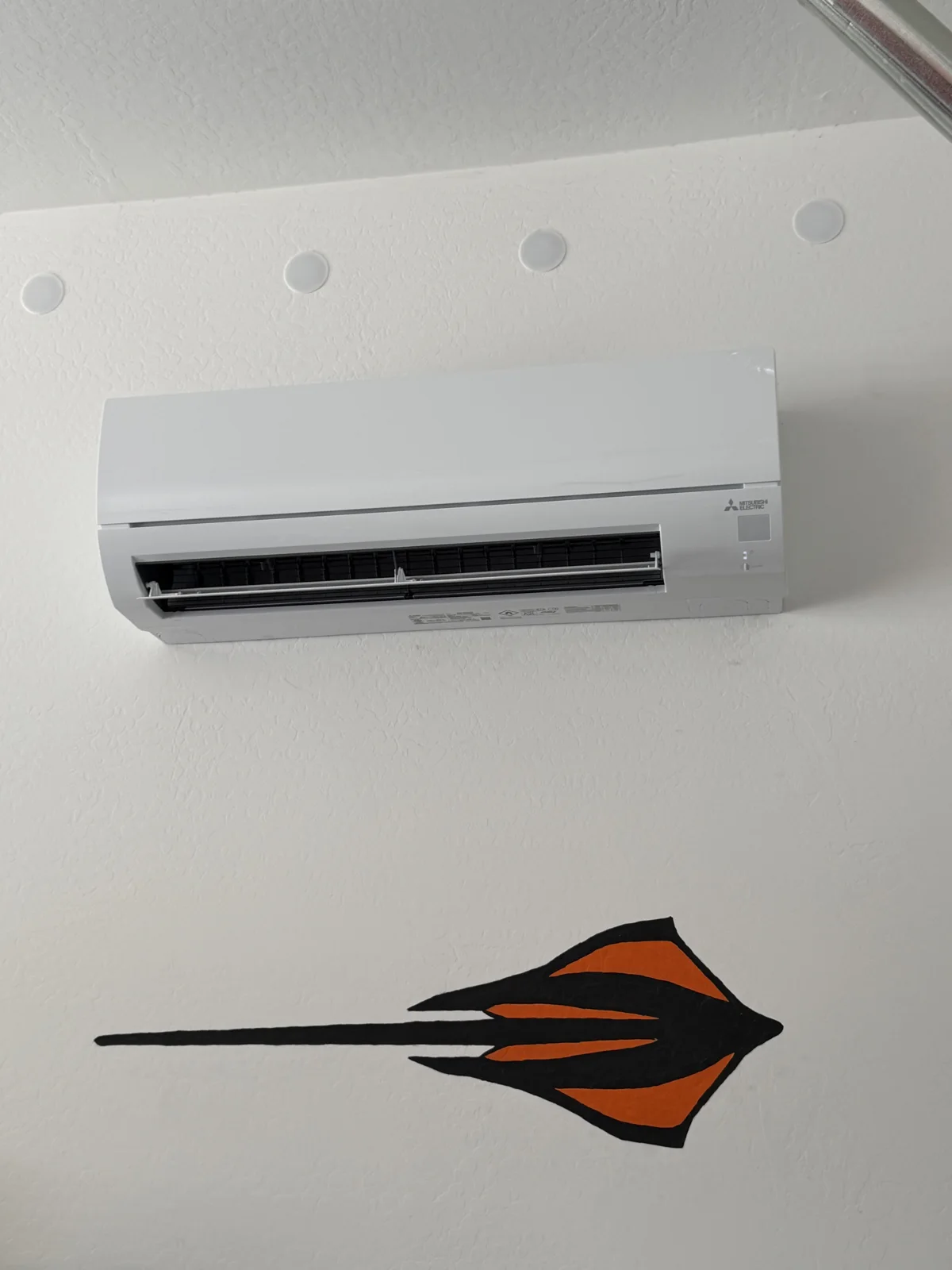 Mitsubishi wall-mounted mini-split in a garage